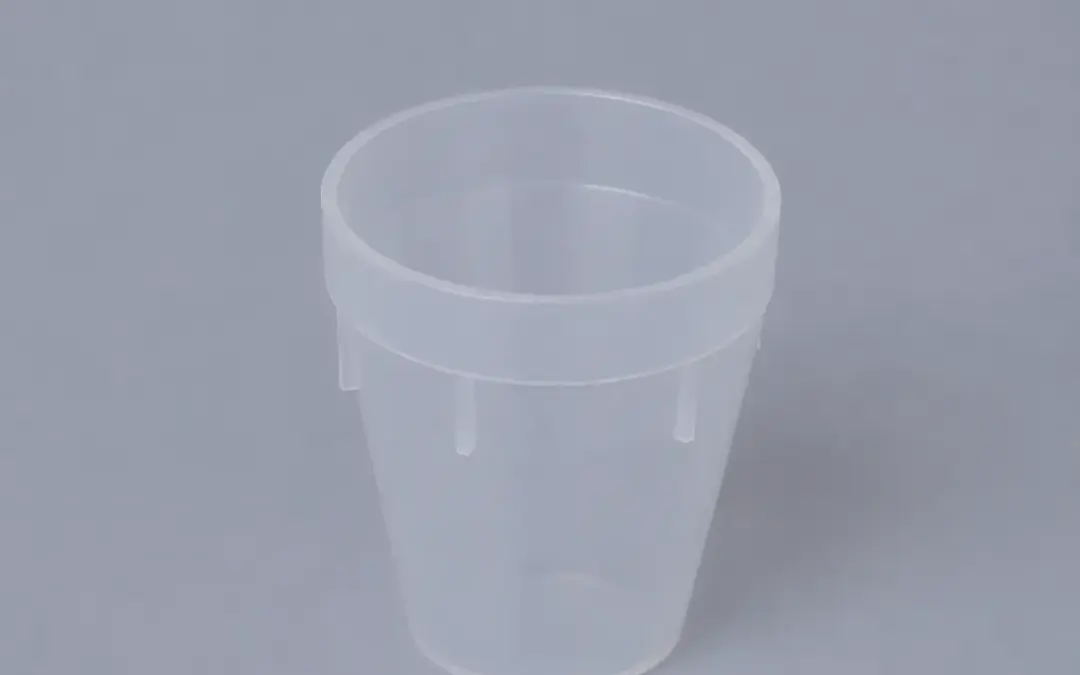 0110 Vasito dosificador con capacidad 10ml y escala de graduación 5 y 10 ml